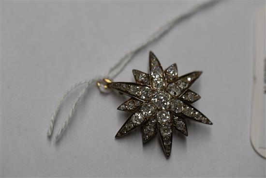 A Victorian gold, silver and old mine and cushion cut diamond set starburst pendant brooch,